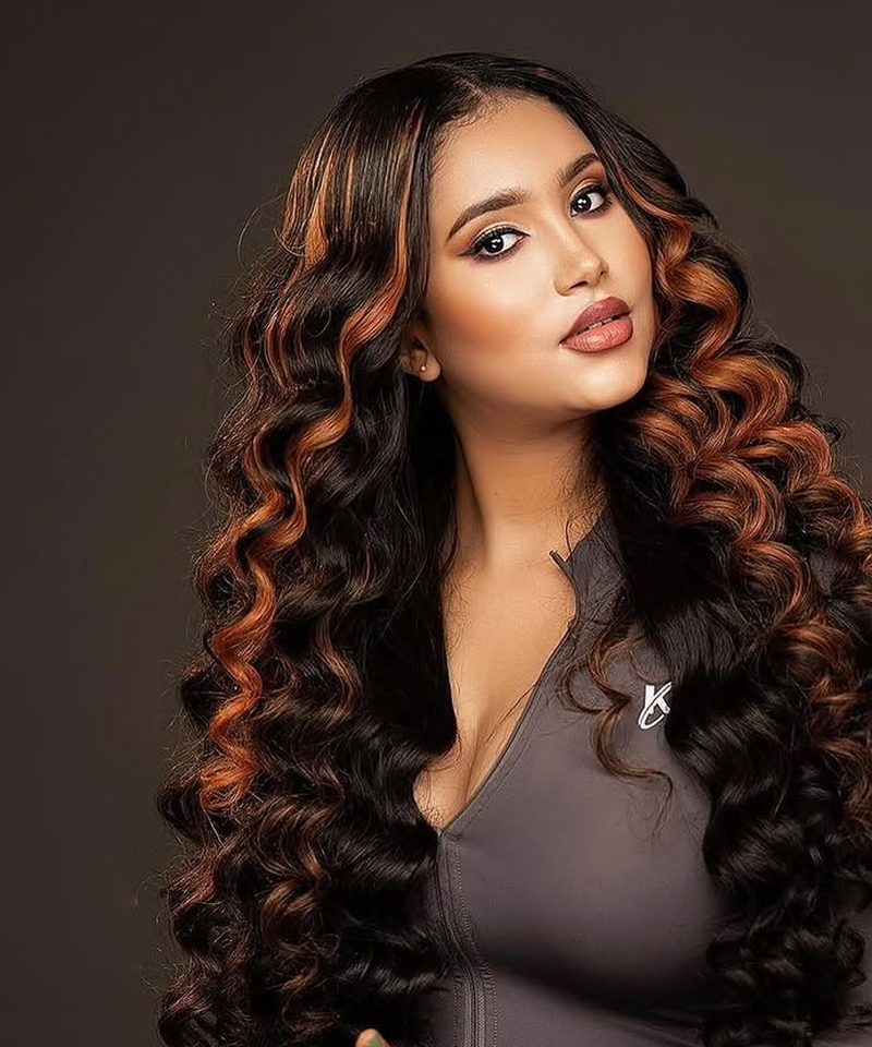 Soft blonde glam waves with side part styling